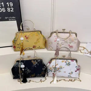 Classic Chinese embroidery handbag with floral patterns and pearl tassel chain