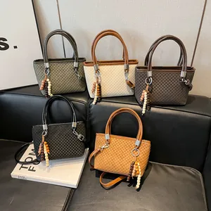 Minimalist checkered bucket bags in five colors with beaded charms for daily commute