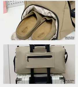 Detail showing a separate shoe compartment and suitcase sleeve for travel bag