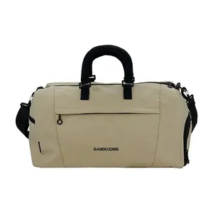 Beige Oxford cloth travel bag with black straps and large capacity for gym and sports