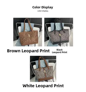 Drei Leoparden-Taschen in Braun, Schwarz und Weiß mit edlen Metallschnallen-Details