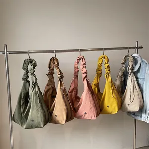 Minimalist large-capacity tote bag with unique scrunchie straps in five varied colors