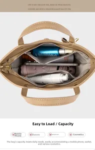 Top view of the spacious interior compartment of this beige bucket bag with daily items