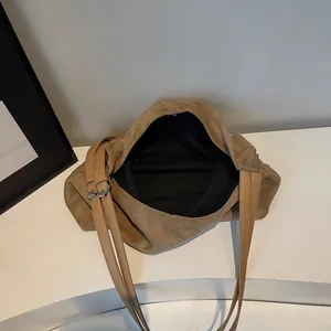 Retro khaki suede tote bag with adjustable leather straps and large capacity interior