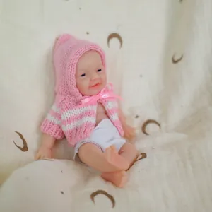 Lifelike 6-inch silicone mini baby doll in pink striped knit hoodie on moon pattern cloth