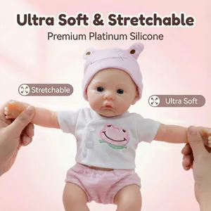 12 inch solid platinum silicone lifelike baby doll with pink frog outfit and hat