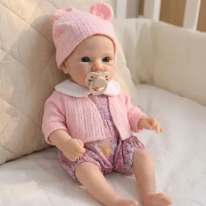 Bambola reborn realistica da 12 pollici con cardigan rosa e pagliaccetto floreale e ciuccio