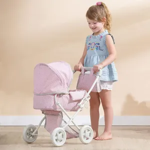 Passeggino per bambole rosa a pois con telaio in metallo bianco e borsa portaoggetti