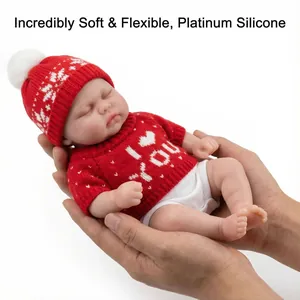 12-inch lifelike platinum silicone baby doll in red heart sweater and knit hat