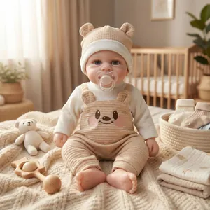 12-inch realistic reborn baby doll in beige bear outfit with matching accessories