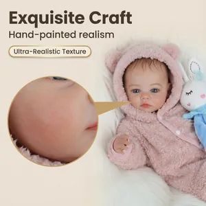 Realistic 49cm reborn doll in pink bear outfit with hand-painted skin and vein details