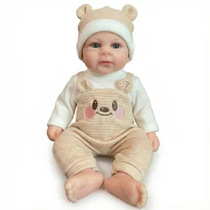 12-inch realistic reborn baby doll in beige bear overalls and matching knit hat