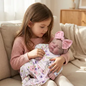 Lifelike 19 inch sleeping baby doll in rabbit print romper with pink velvet bow headband