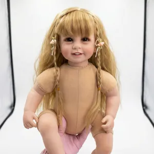 Realistic reborn doll with golden hair and a smiling face in a light tan bodysuit