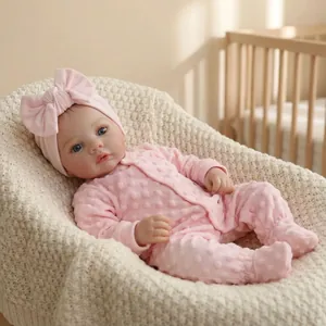 18 inch realistic Reborn baby doll Meadow in pink polka dot romper and bow headband