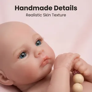 Realistic 12 inch solid baby doll with floral outfit and blue eyes for Christmas gift