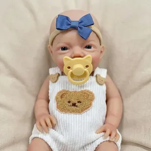 Poupée bébé reborn réaliste 12 pouces en barboteuse rayée blanche avec patch ours et sucette