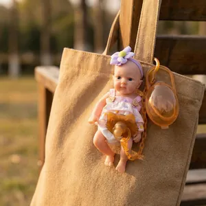 8 inch soft silicone reborn baby doll with purple flower headband and floral dress