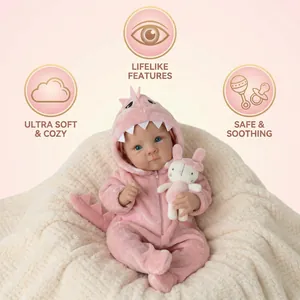 18 inch lifelike reborn baby doll in soft pink dinosaur onesie with plush bunny accessory