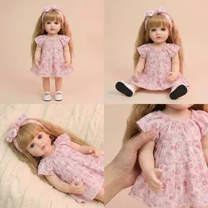 22-inch realistic reborn baby doll Betty with blonde hair and floral bow dress