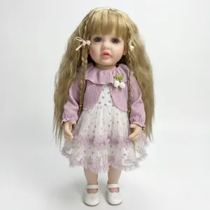 Lifelike 22-inch reborn doll Betty with wavy blonde hair and purple knit cardigan dress