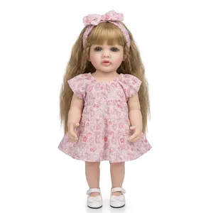 Detailed view of 22 inch reborn doll with blonde hair, floral dress and white shoes