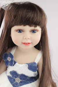 Close-up of 18 inch doll featuring brown long hair and floral lace dress details