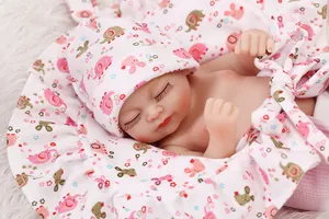 Close-up of lifelike soft newborn baby doll skin with fine hand-painted facial details