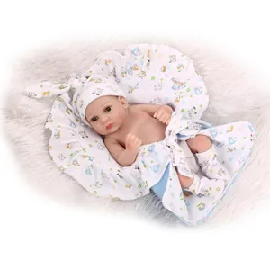 Realistic soft silicone newborn baby doll in blue cartoon animal print wrap and hat set