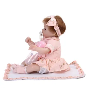 Realistic reborn baby doll set with floral dress, magnetic pacifier and bottle