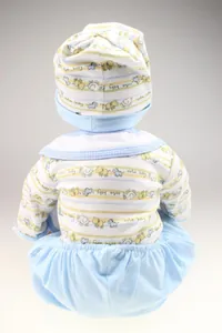 Rear view of infant doll clothing set featuring striped lamb pattern and cute baby text