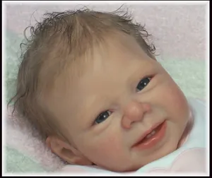 Close-up of lifelike silicone reborn doll featuring realistic skin texture and facial details