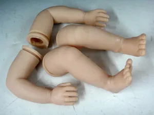 Detailed view of replacement vinyl limbs for reborn dolls including arms and legs