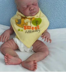 Macro detail of the realistic skin texture and creases on this soft silicone reborn doll