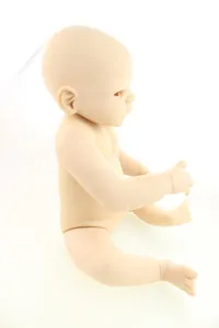 Unpainted soft vinyl reborn doll kit showing realistic skin folds and baby limbs
