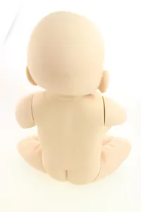 Detailed back view of unpainted vinyl reborn doll kit showing head and joint structure