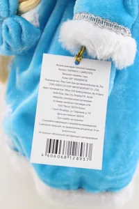 Detailaufnahme der Homeclub Schneemädchen-Keramikpuppe mit Original-Papieretikett
