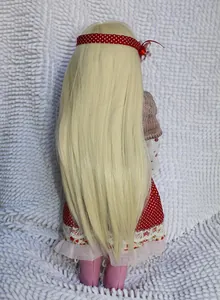 Long straight light blonde doll wig accessory shown from a back view on a princess doll