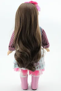 Detail of 18-inch girl doll with long wavy brown hair and floral mesh skirt