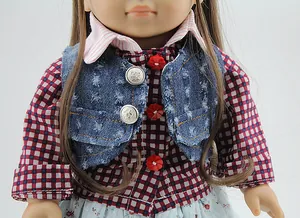 Detail of American girl doll outfit with plaid shirt, denim vest and floral skirt
