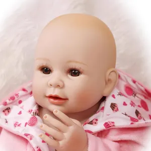 50cm realistic silicone reborn baby doll with pink plush hoodie and brown eyes