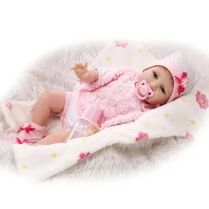 Bambola Reborn Realistica in Vinile di Silicone Morbido Con Vestito a Pois Rosa e Accessori per l'Alimentazione Regalo per Bambini