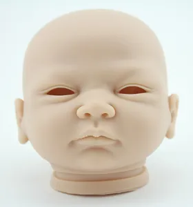 Detailed view of vinyl reborn baby doll head mold with precise facial features for DIY
