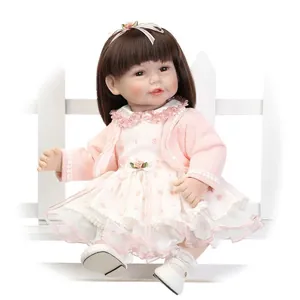 Realistic Reborn Baby Doll Silicone Vinyl Plastic Girl Doll Soft Cloth Body Lifelike Pink Polka Dot Dress Doll For Kids Birthday Gift