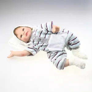 Realistic silicone reborn baby doll in striped jumpsuit and white knitted hat for kids gift