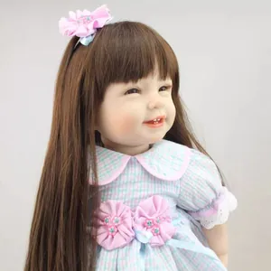 Realistic long hair reborn baby doll wearing a pink floral plaid dress for girls