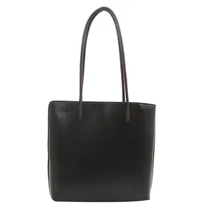 Minimalist large capacity black leather tote bag with dark brown shoulder straps
