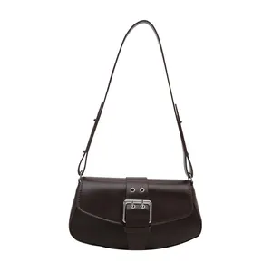 Deep brown minimalist faux leather underarm bag with decorative silver buckle