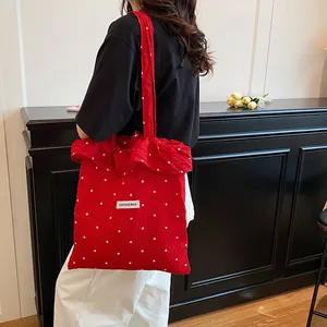Borsa tote in tela rossa a fiori con volant e tracolla singola per donna