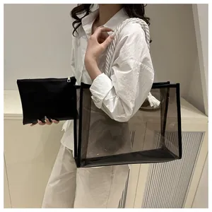 Detail of transparent brown tote bag with thick cotton rope straps and black inner pouch